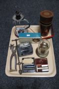 A tray of Art Deco lamp base, miniature PYE transistor radio, razors, clock under shade,