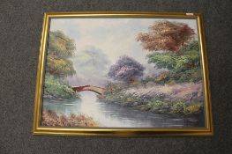 20th century school: River landscape with bridge, oil on board, indistinctly signed, 56cm by 79cm.