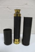 A brass and leather cased pocket telescope