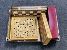 A box of boxed Bagatelle board, two wooden chess boards,