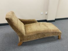 A contemporary chaise longue in leopard print