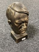 A cast metal bust of Hitler