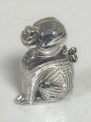 A novelty silver vesta in the form of a seated dog, stamped sterling, height 5.5cm.