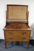 An Edwardian mahogany two drawer dressing chest