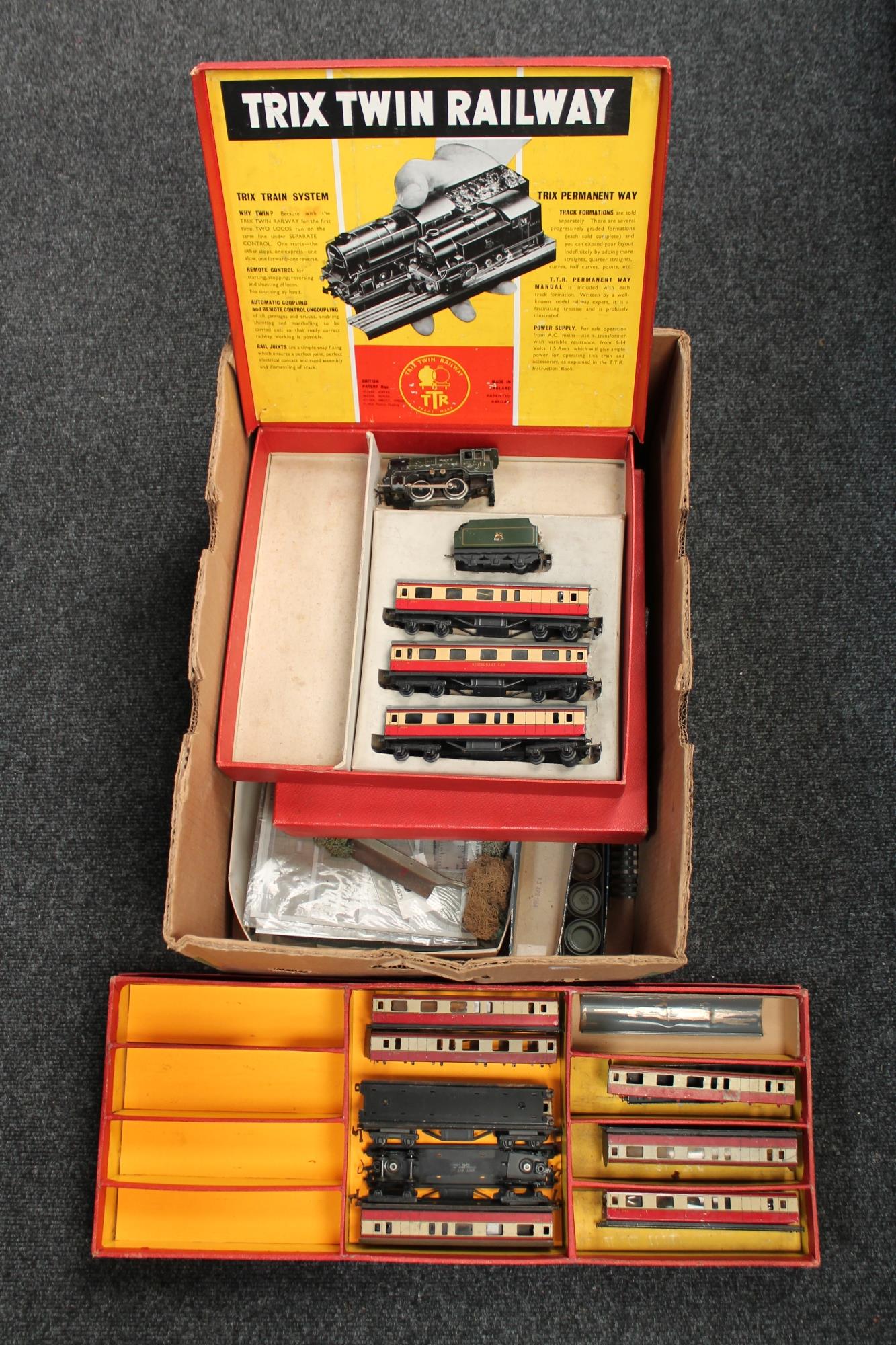 Two boxes of Trix twin railway rolling stock