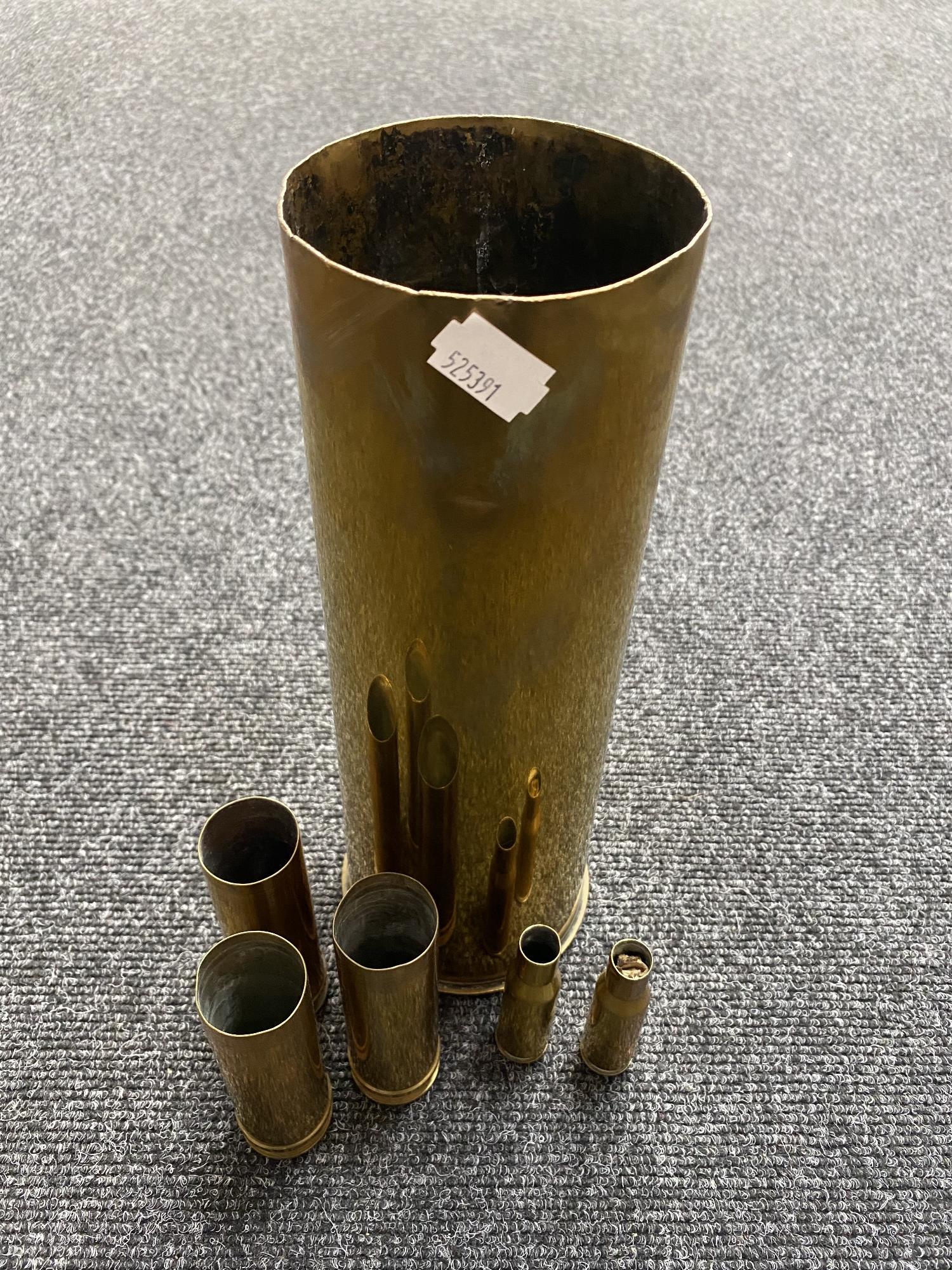 Six brass ammunition casings