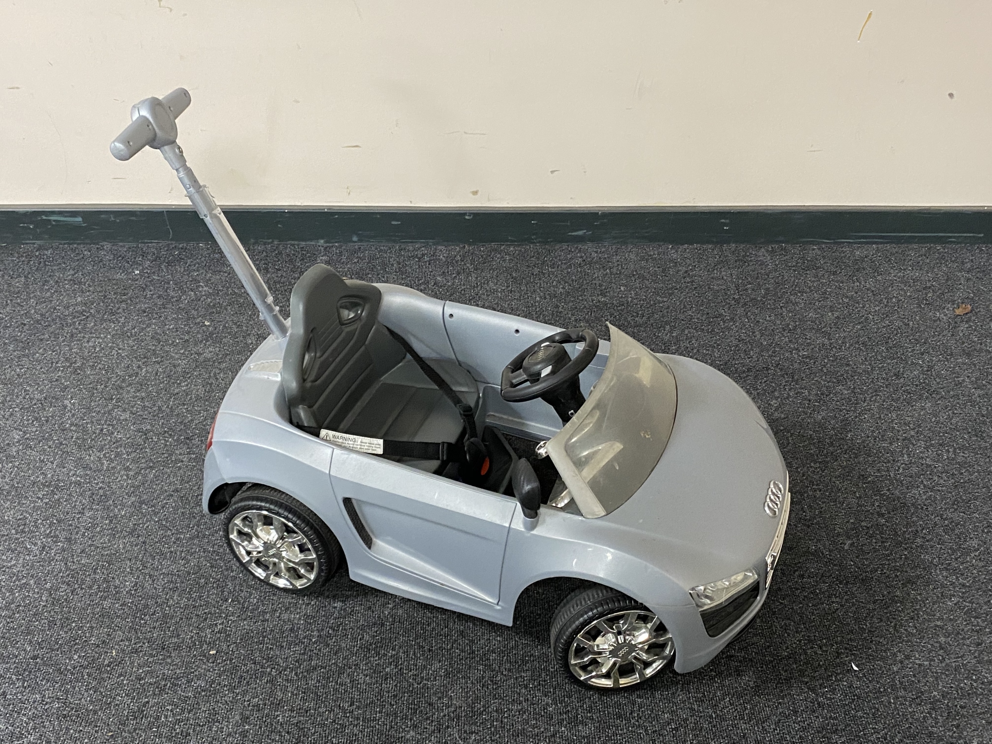 A child's Audi push along car