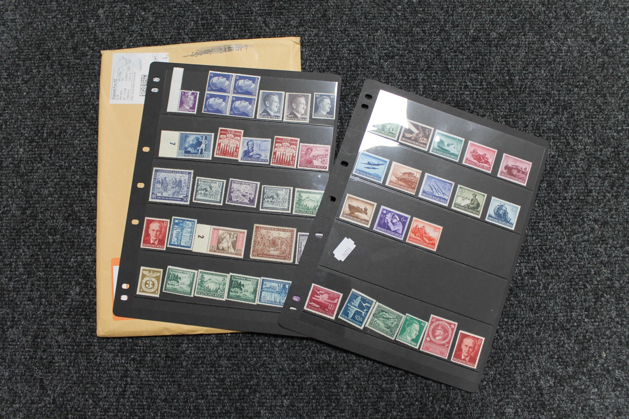 Two sheets of German Third Reich stamps