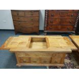 A Barker and Stonehouse Flagstone collection storage coffee table fitted with eight drawers,