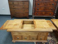 A Barker and Stonehouse Flagstone collection storage coffee table fitted with eight drawers,