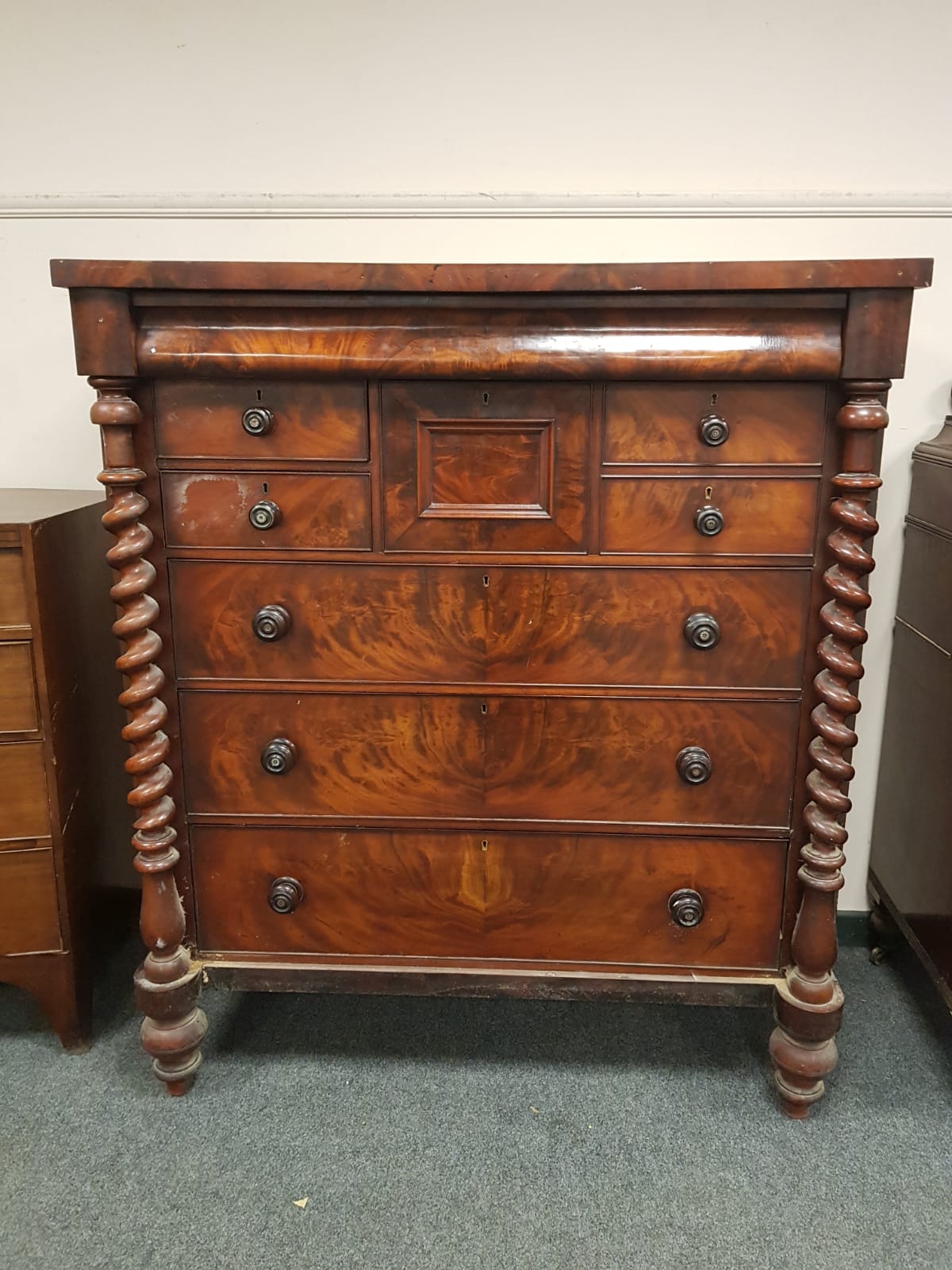 A Victorian mahogany Scotch chest on barleytwist supports with central hat drawer, width 124 cm.