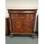 A Victorian mahogany Scotch chest on barleytwist supports with central hat drawer, width 124 cm.