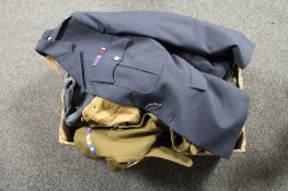A box of Army and Navy uniforms,