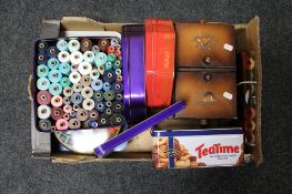 A box of sewing box and tins,