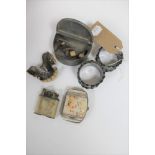A pair of silver napkin rings together with an antique pewter box, miniature mother of pearl purse,