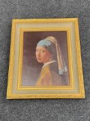 A gilt framed print on canvas of Girl with a Pearl Earring after Vermeer, with certificate.