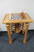 A contemporary beech handmade "floating" chess table, with inset marble chess board,