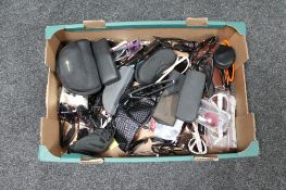 A box of assorted sunglasses