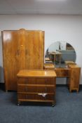 A three piece 1930's walnut bedroom suite; double wardrobe,