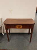 An Edwardian inlaid mahogany tea table, width 92 cm.