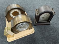 A tray of three mantel clocks and a brass carriage clock