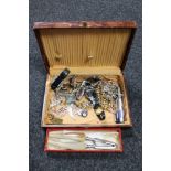 A box of costume jewellery, nut crackers, lady's and gent's wristwatches including Pierre Cardin,