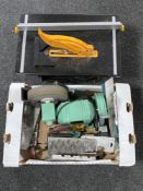 A Tooltec electric table saw together with a box containing Tooltec grinder, garden tools,