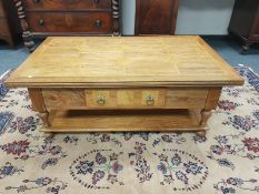 A Barker and Stonehouse Flagstone collection coffee table with undershelf,