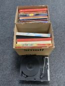 A portable Fidelity 7" record player together with two boxes containing vinyl LP box sets