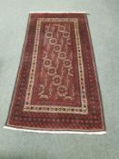 A Persian rug, on red ground,