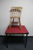An antique pine kitchen chair together with a folding card table