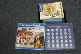 A tray containing Esso FA cup centenary medal set together with three books relating to football