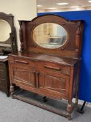 An early 20th century mirror backed sideboard