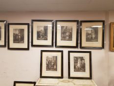 A set of 15 monochrome engravings depicting figures and taverns, in ebonised frames.