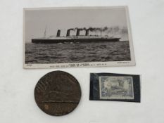 A Lusitania postcard sent from Grenada together with a Lusitania medal and stamp