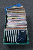 A crate of LP's and seven inch singles - Eagles, The Beatles,