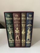 A set of four Folio Society volumes, Empires of the Ancient Near East,