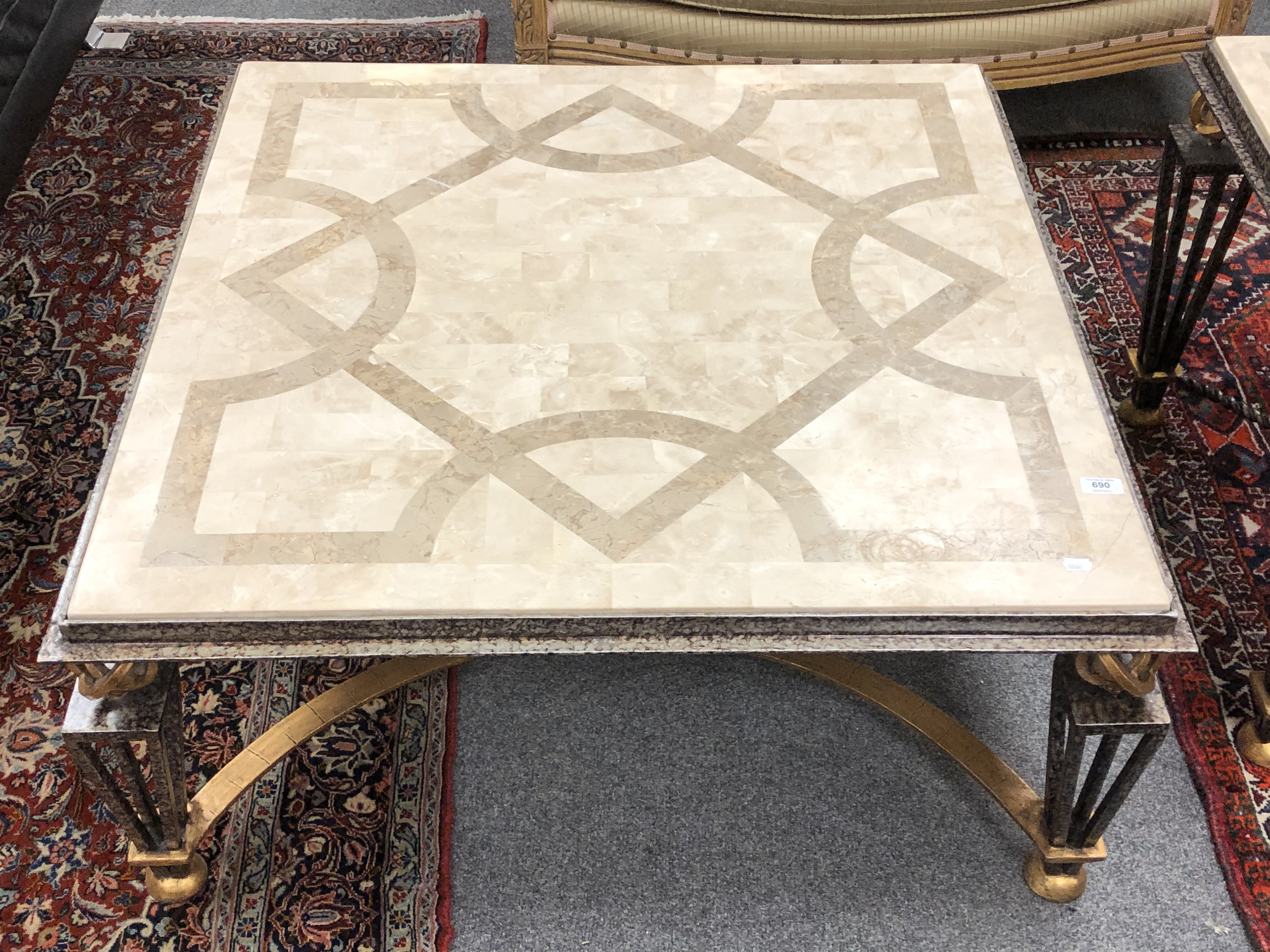 A contemporary marble topped metal based coffee table, width 100 cm.