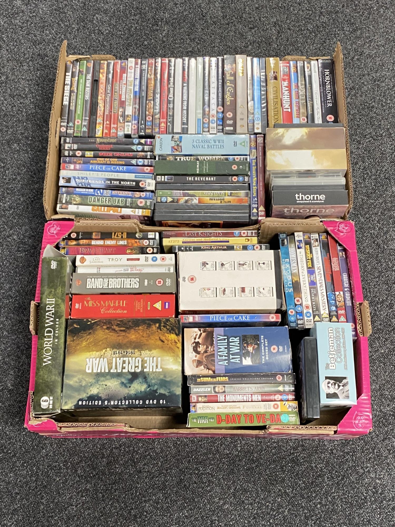 Two boxes containing DVD's and DVD box sets including The Great War, Band of Brothers,