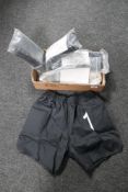 A box of six pairs of East German goalkeeper's shorts,