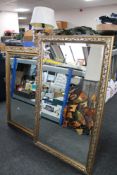 Two decorative gilt framed bevelled mirrors