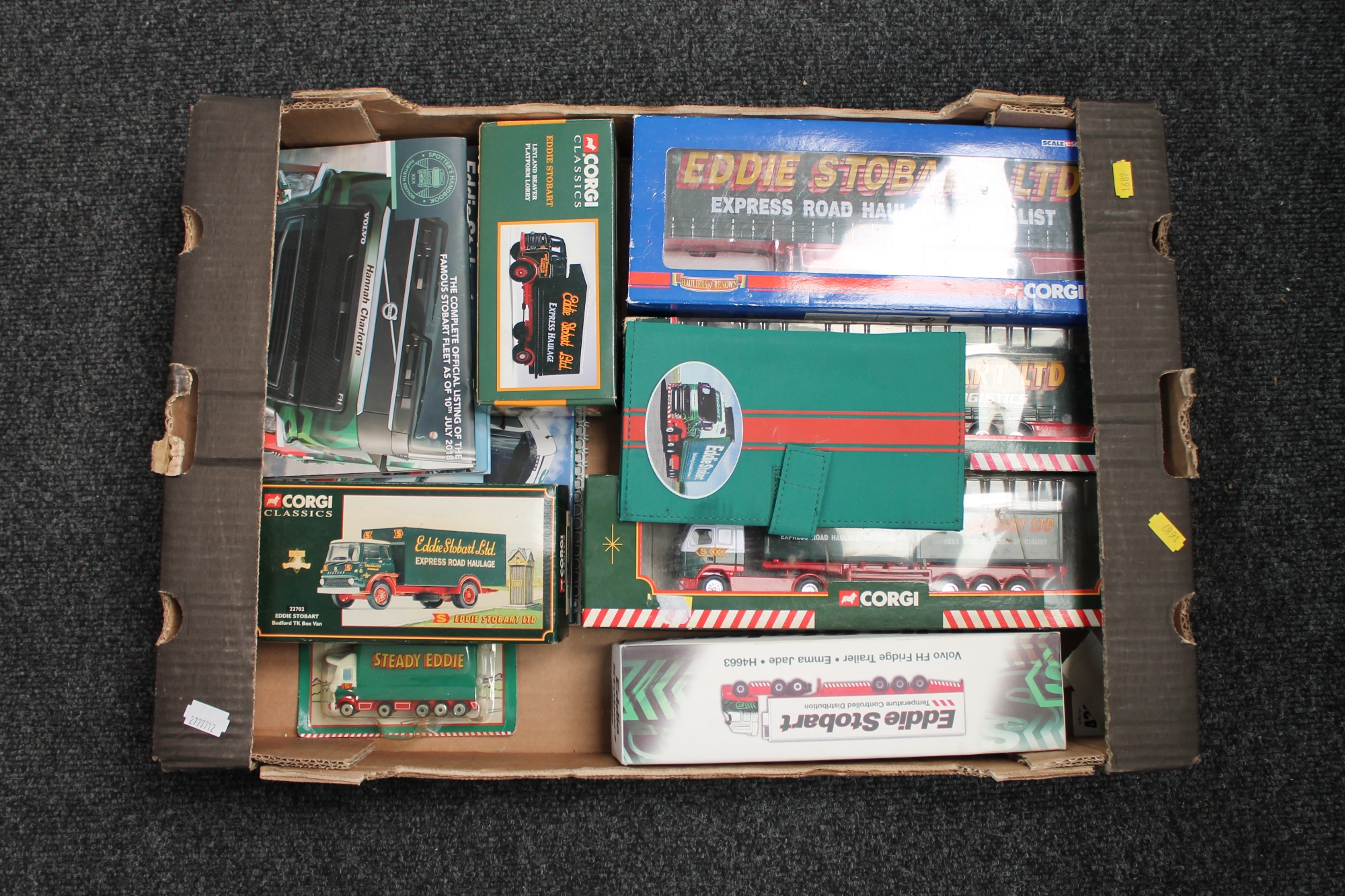 A box of Corgi Classics and Atlas boxed die cast Eddie Stobart vehicles