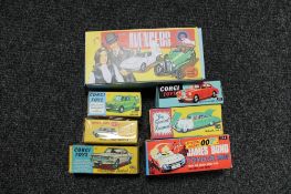 A collection of Corgi die cast vehicles in reproduction boxes;