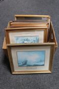 A box of framed prints,