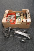 A box of wire metal model of a vintage racing car, boxed card games,