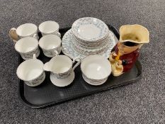 A tray of nineteen pieces of Royal Stafford Harmony tea china together with a Toby Wood