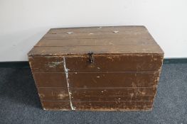 An antique painted pine storage box