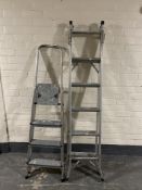 A set of folding aluminium multi function ladders together with a further set of folding steps