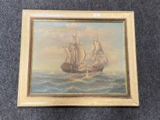 A painted framed oil on board - galleon in battle, by S.