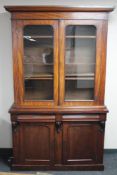 A Victorian mahogany double glazed bookcase fitted with drawers CONDITION REPORT: